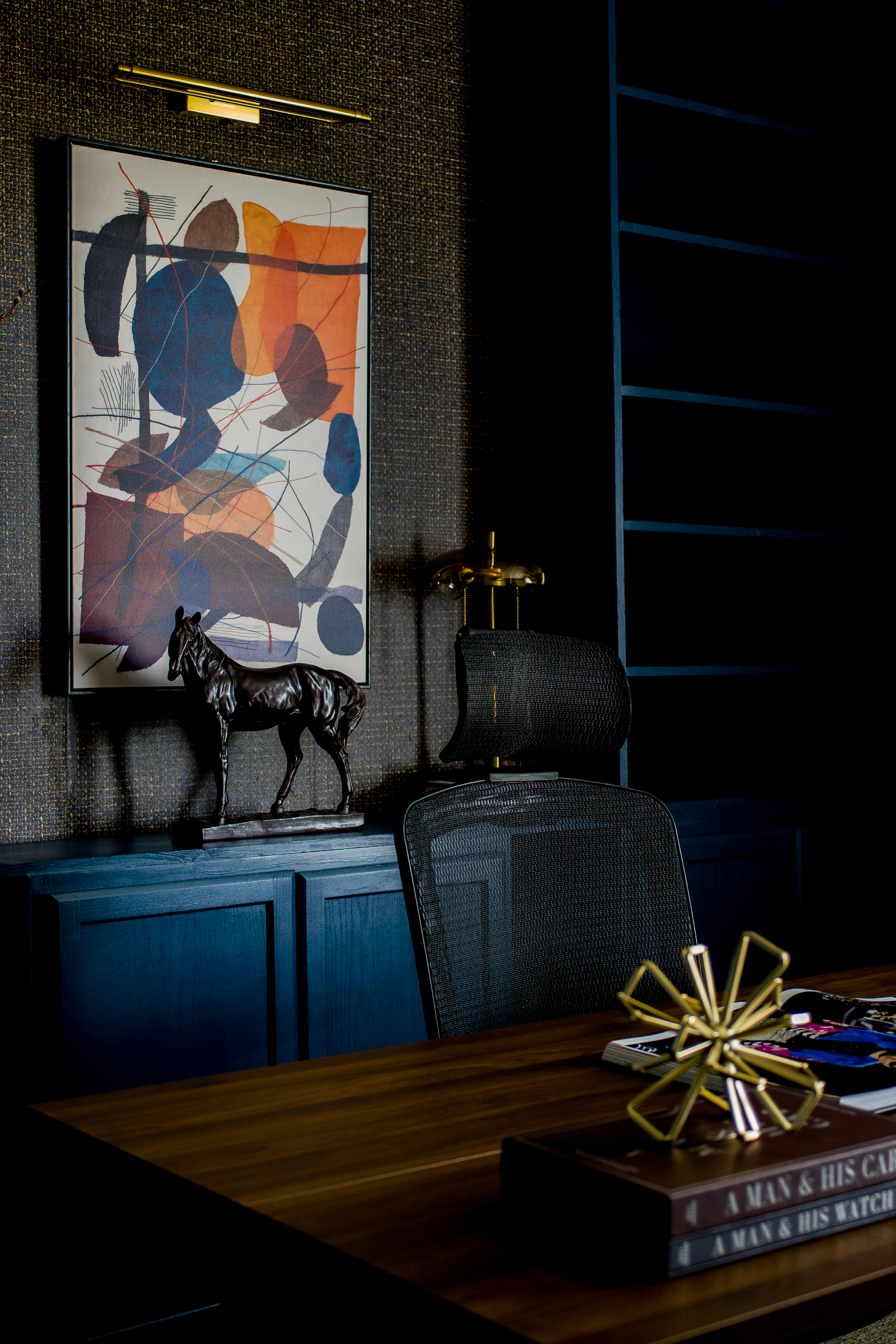 Abstract art canvas and bronze horse sculpture detail