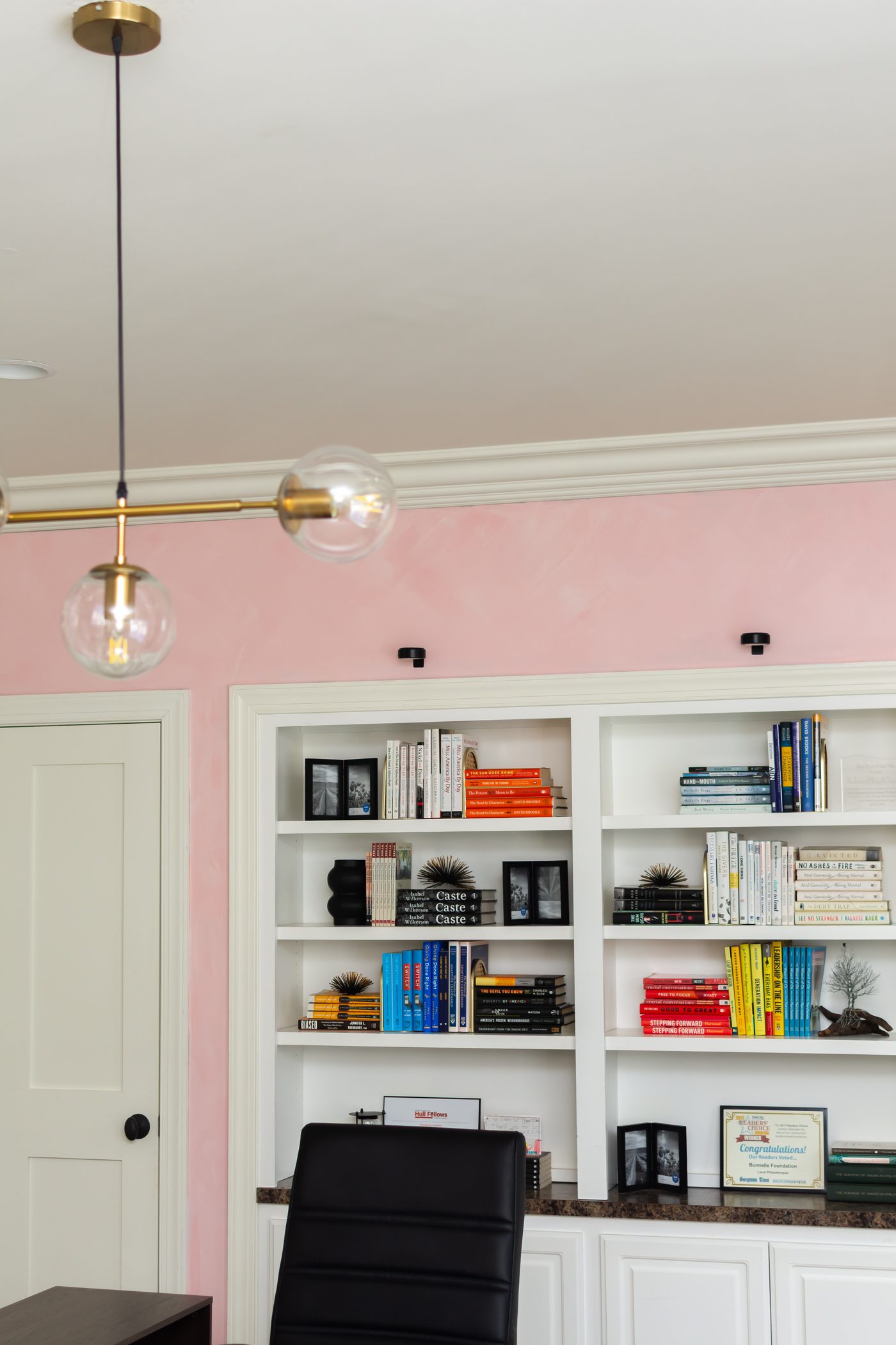 Bookshelf detail with pendant