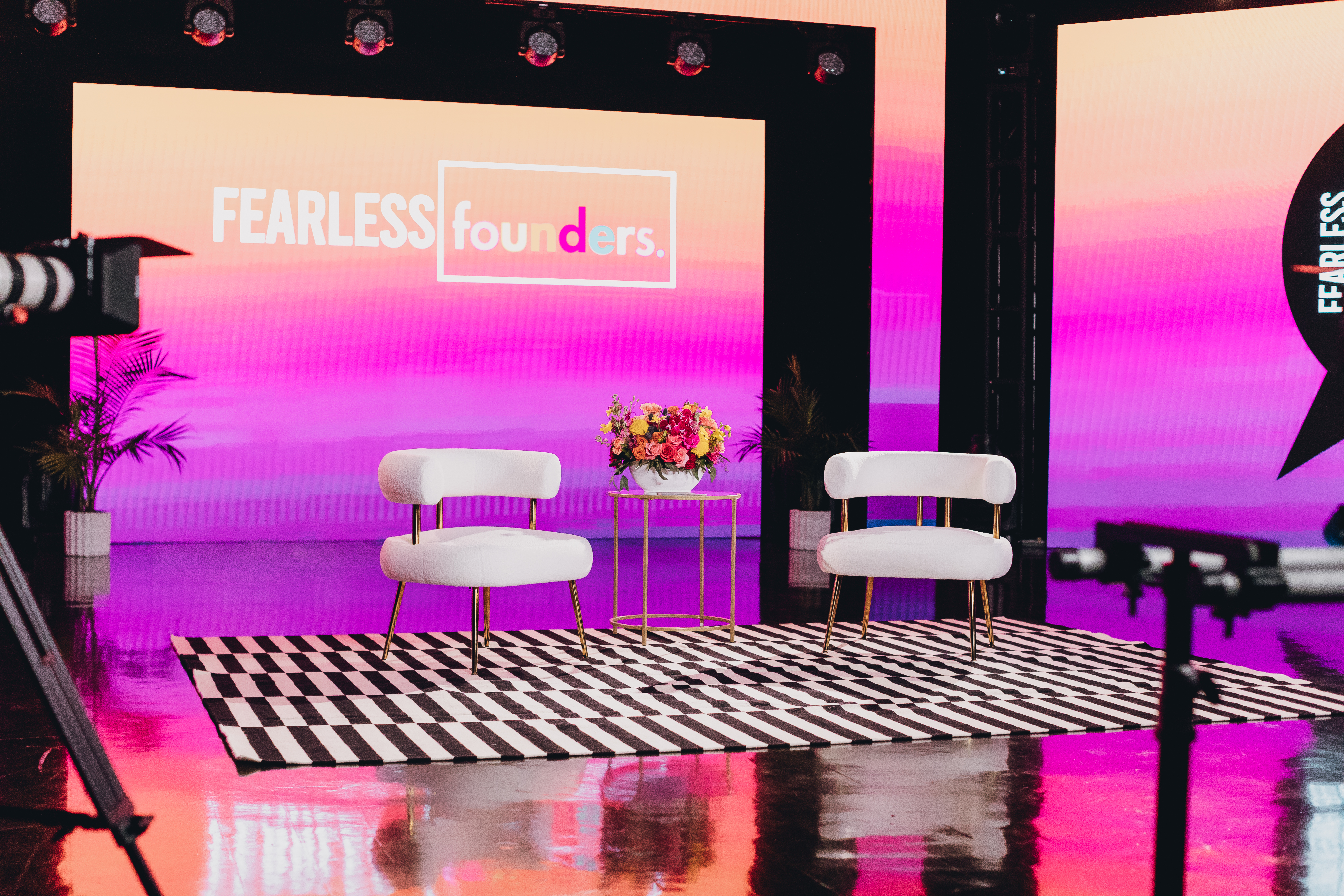 Fearless Founders studio set — full stage with pink gradient backdrop